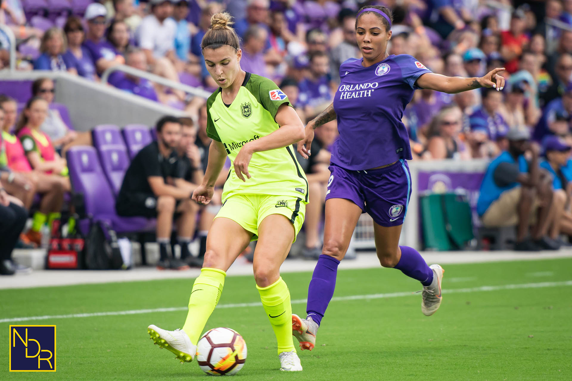 ORLANDO, FL - JULY 07: Orlando Pride forward Marta (10) gets her shot on  goal blocked by Washington Spirit defender Estelle Johnson (24) during the  NWSL soccer match between the Orlando Pride